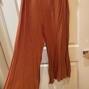 Free People wide leg pants, deep orange with delicate white polka dots